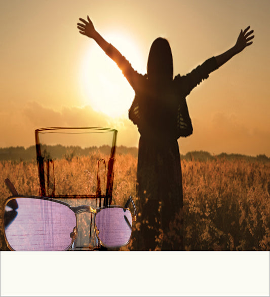 Shiur VaShir silhouette of a girl standing in a corn field with hands raised in gratitude, set below an image of rose-colored glasses and a half-full cup of joy.